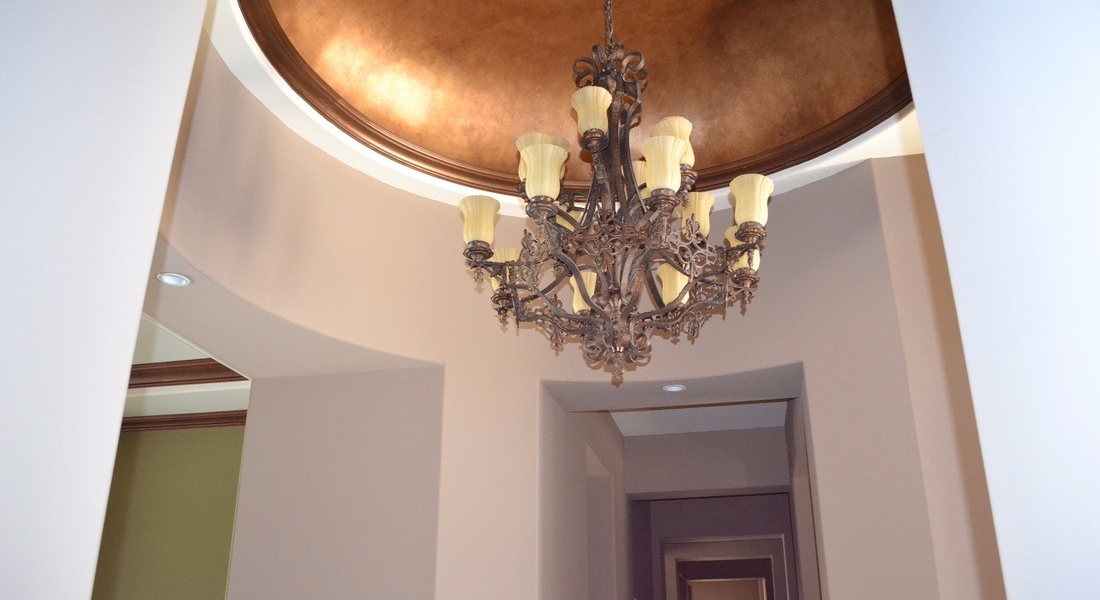 domed ceiling detail with metallic finish